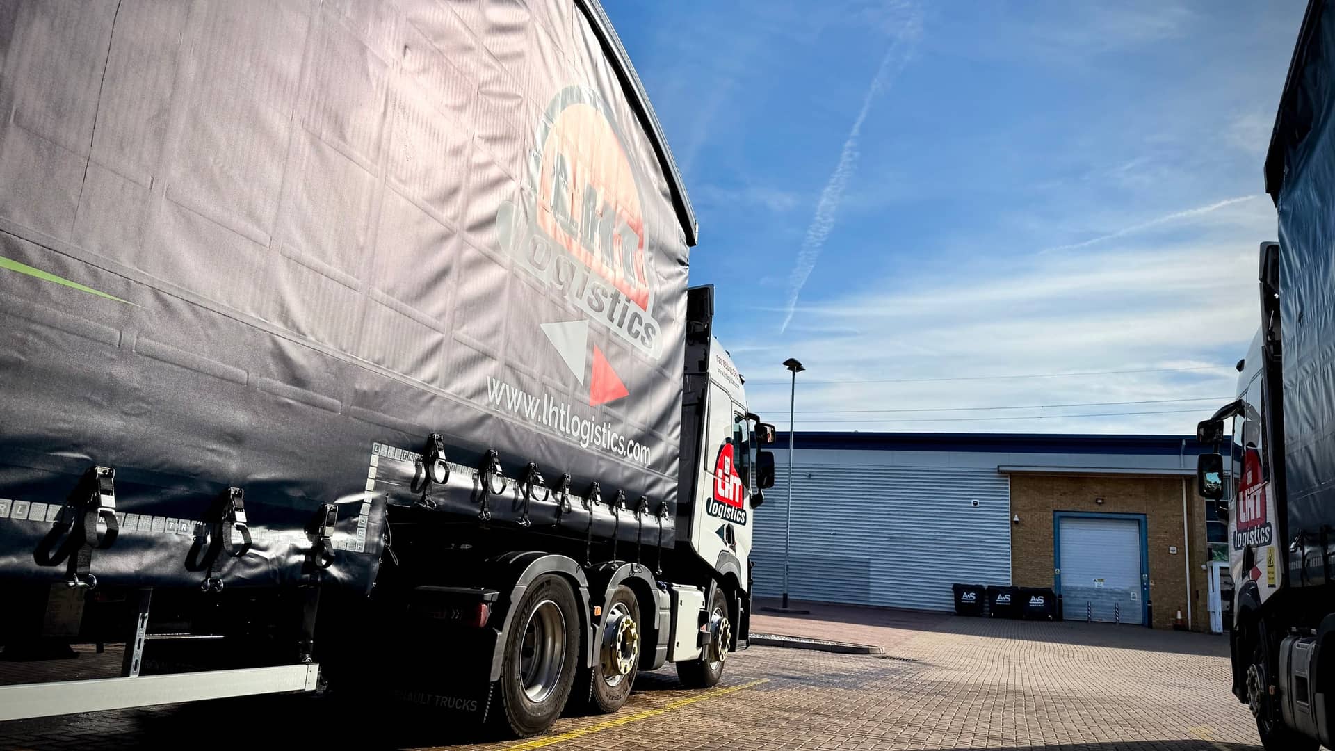 Commercial vehicles lined up after mobile fleet cleaning by PWS