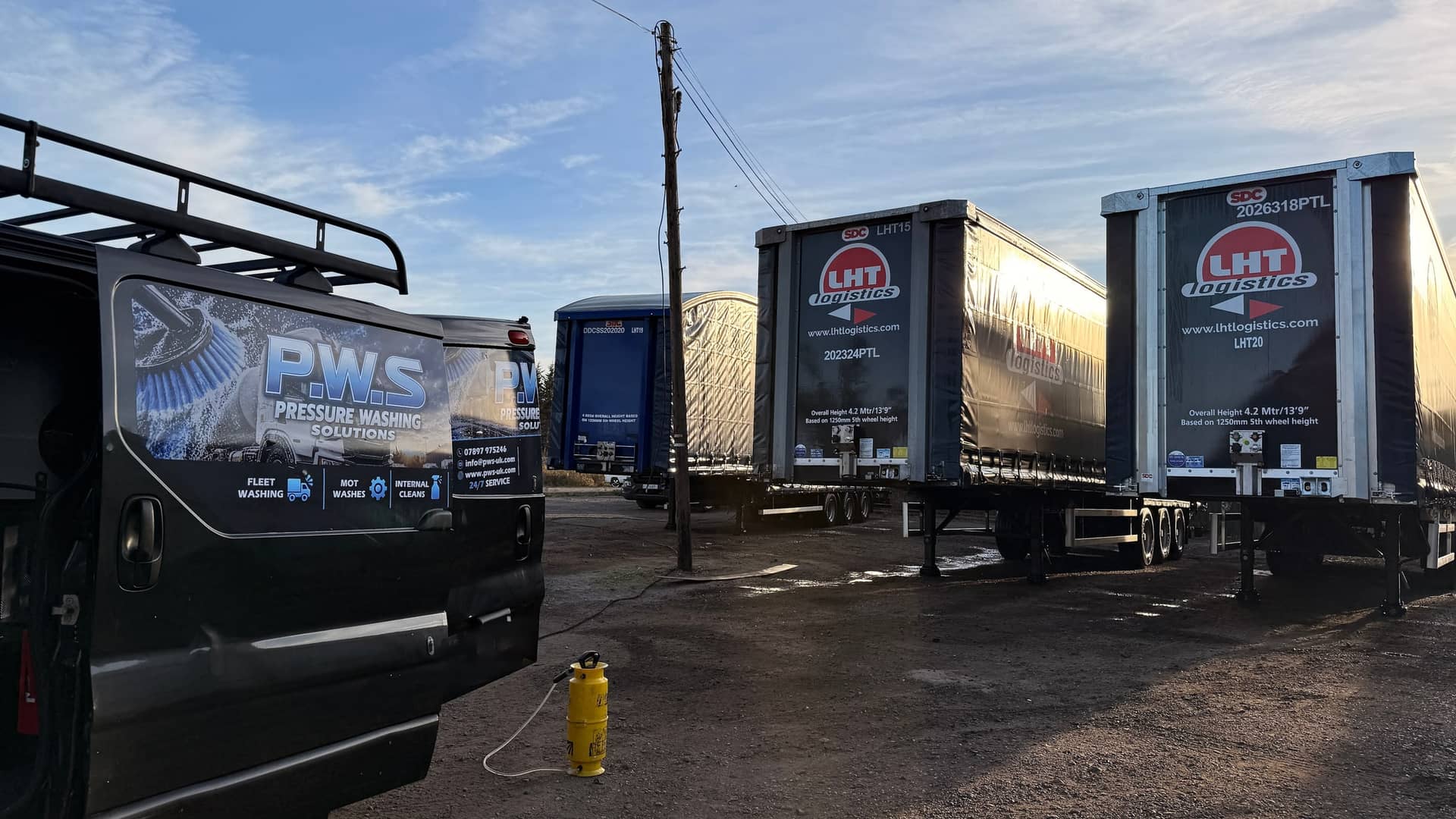 PWS mobile washing van beside commercial fleet trailers