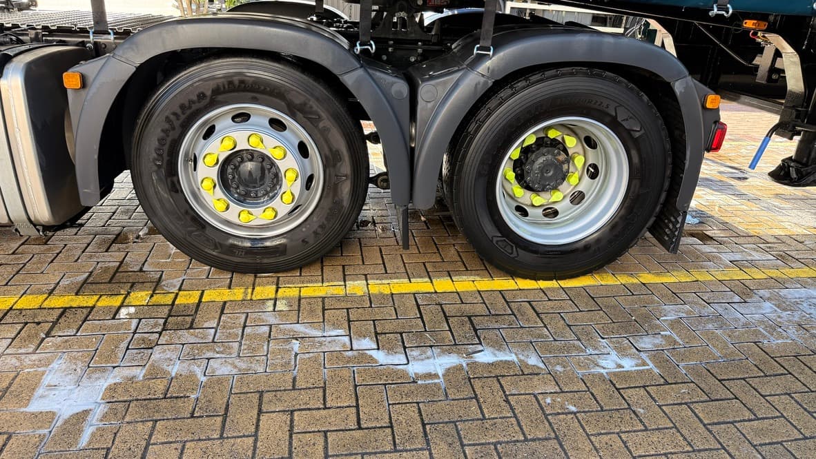 Clean commercial vehicle wheels following an on-site fleet wash