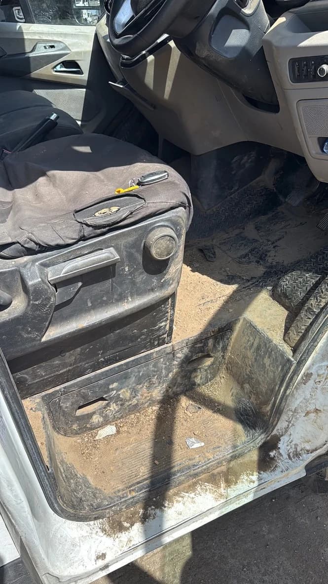 Door and footwell before cleaning