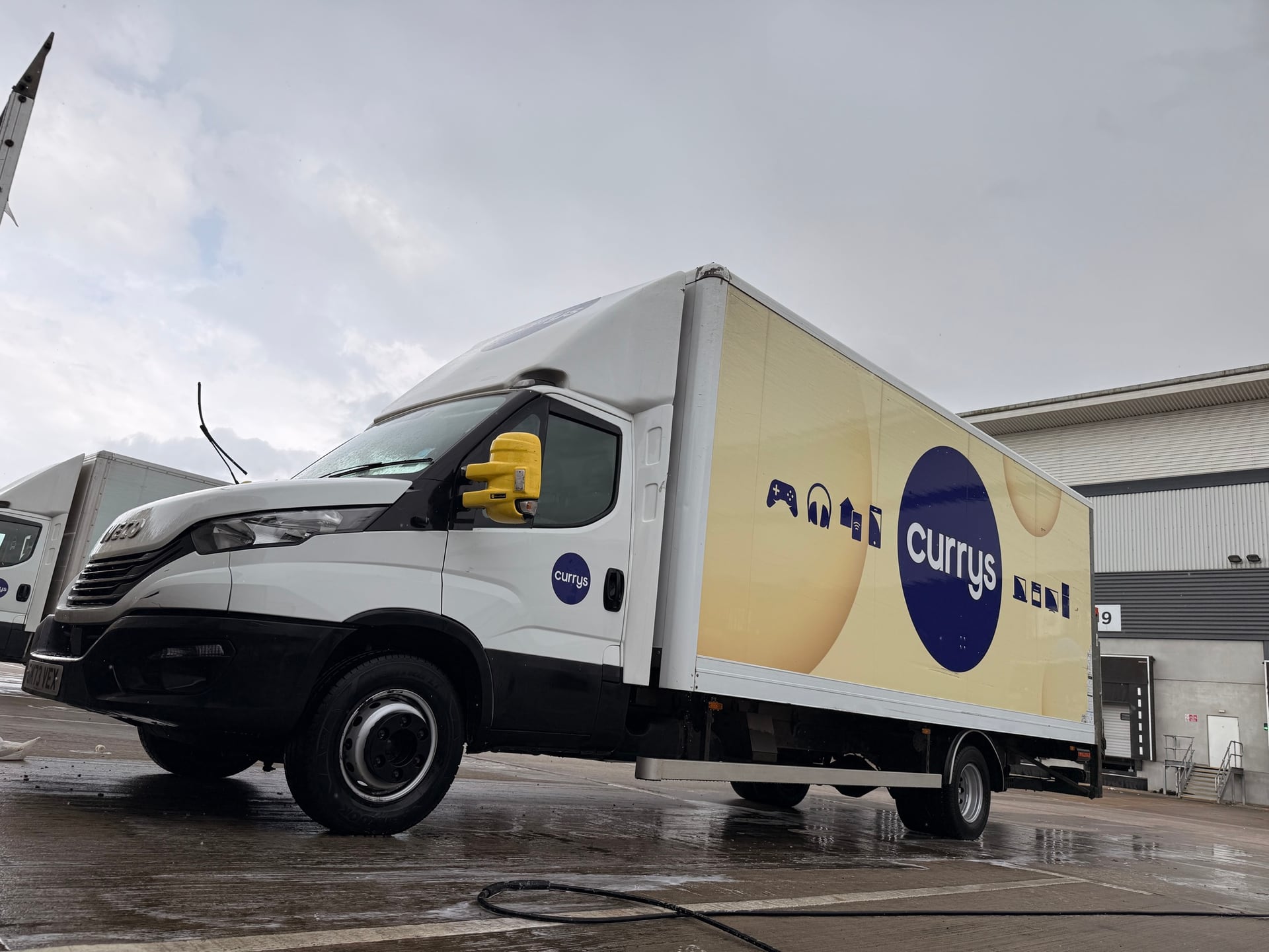 Commercial delivery vehicle after exterior cleaning at a depot