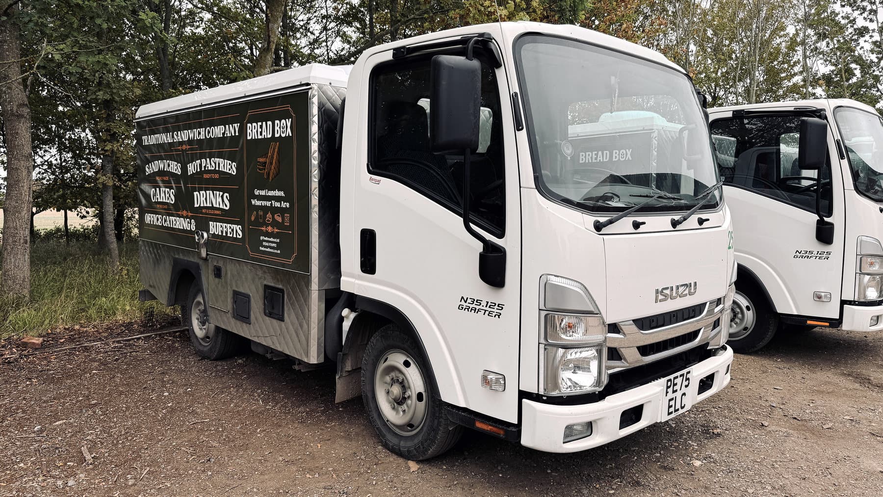 Commercial catering vehicle before an on-site exterior wash