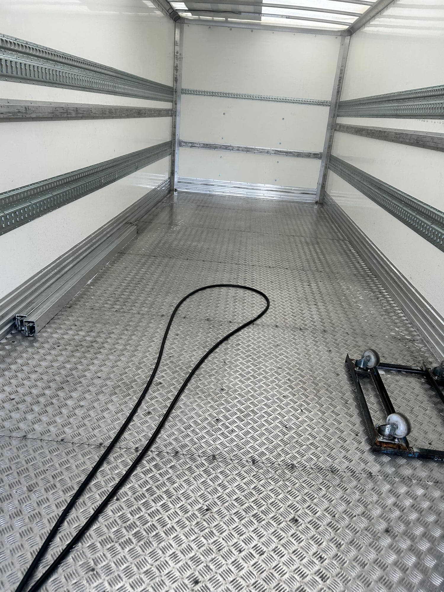 Clean commercial load area after interior washing