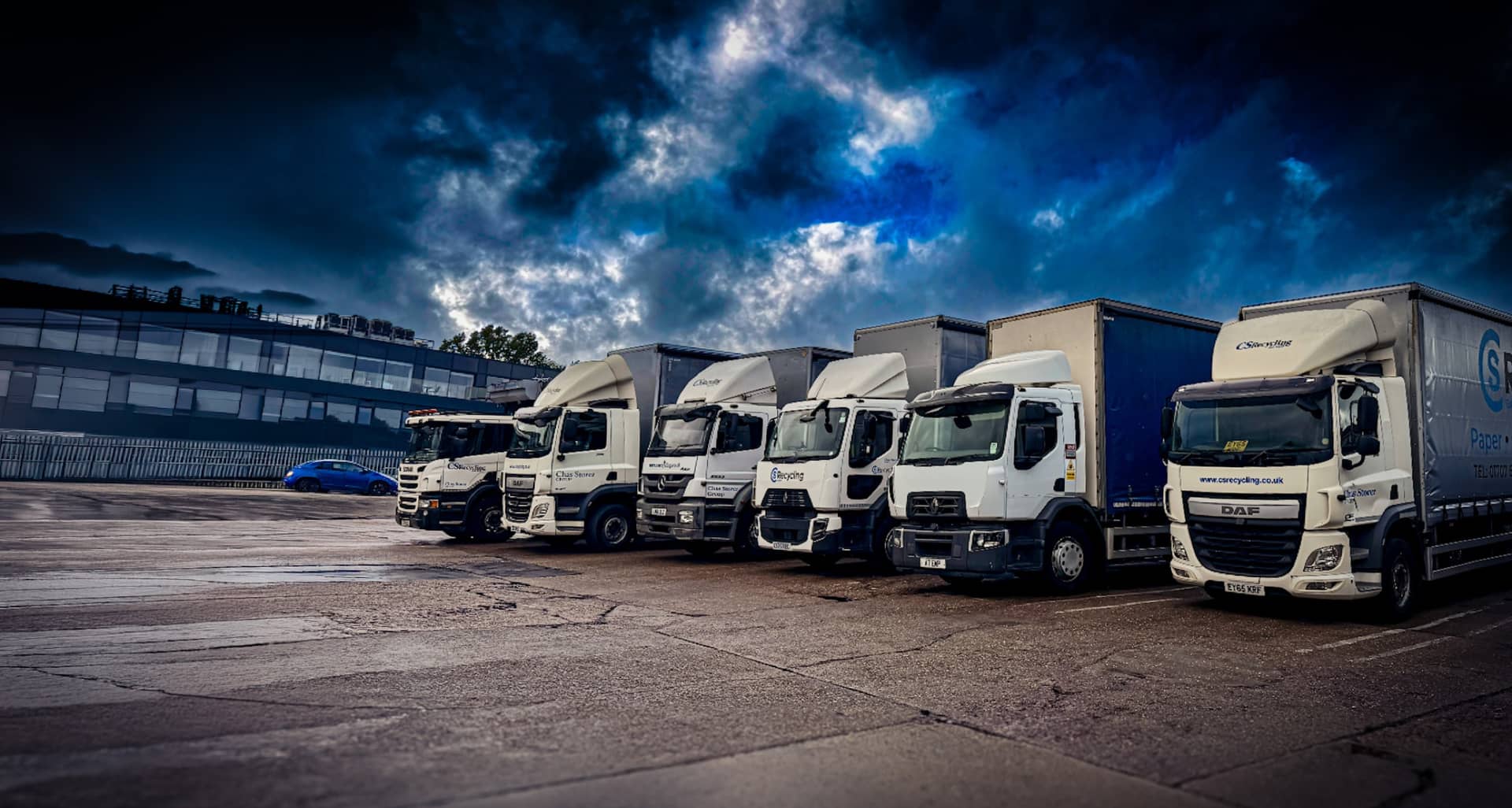 A line of commercial vehicles ready for a regular PWS fleet wash