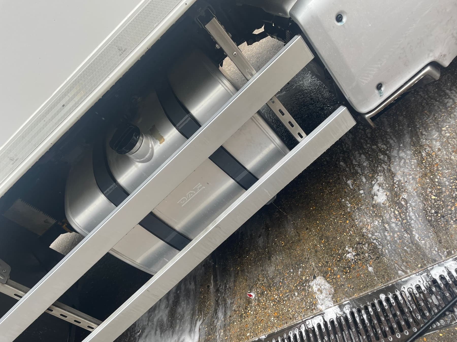 The same commercial vehicle fuel tank and side guard after cleaning