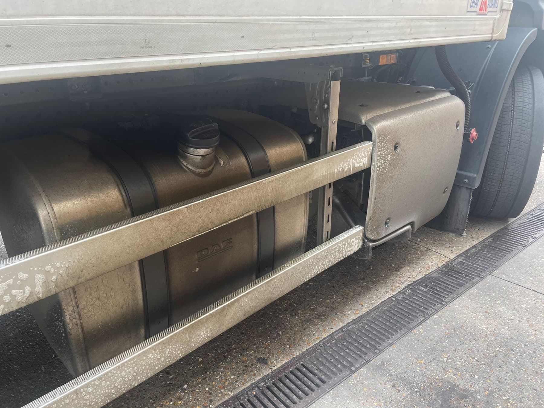 Commercial vehicle fuel tank and side guard before cleaning