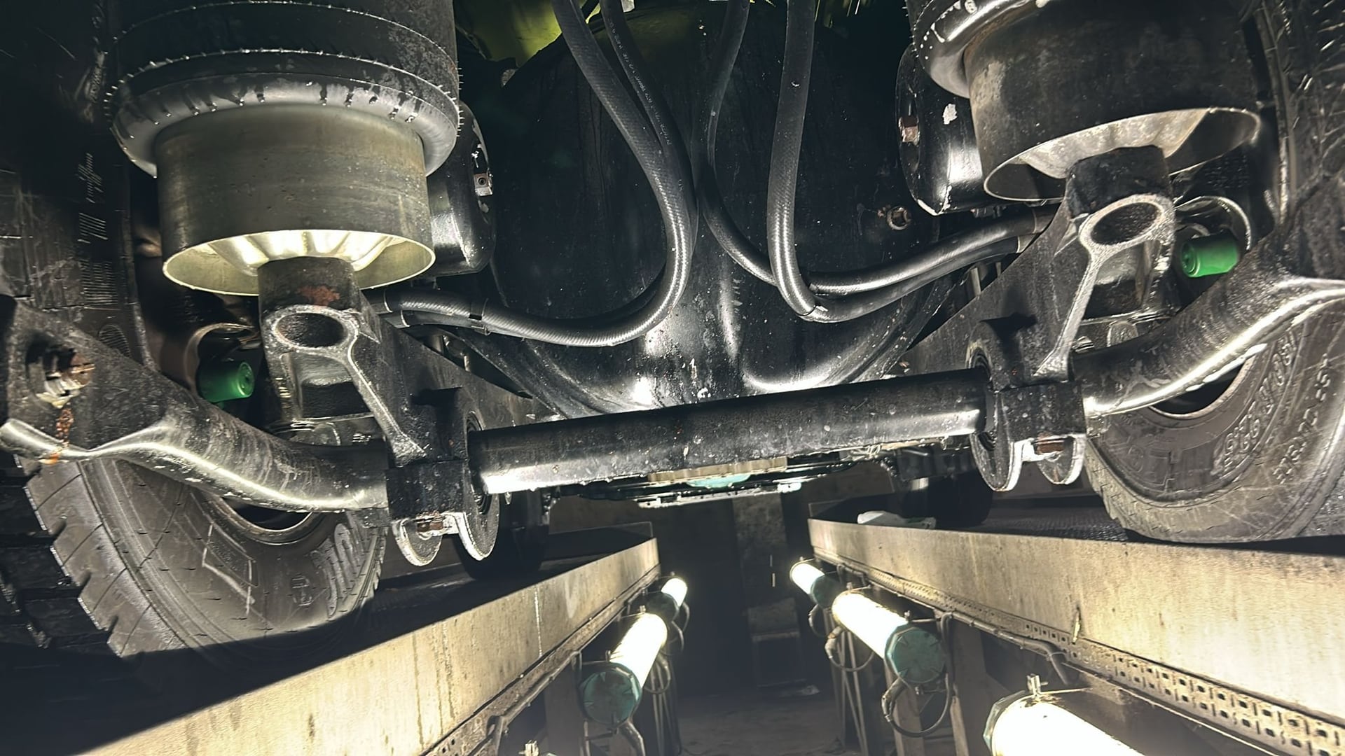 Clean underside of a rigid commercial vehicle prepared for inspection