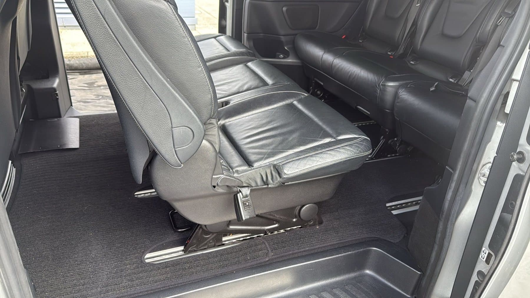 Clean black seating inside a Mercedes commercial vehicle after valeting